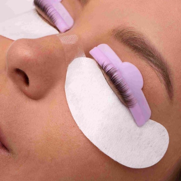 woman-wearing-eye-patches-high-angle